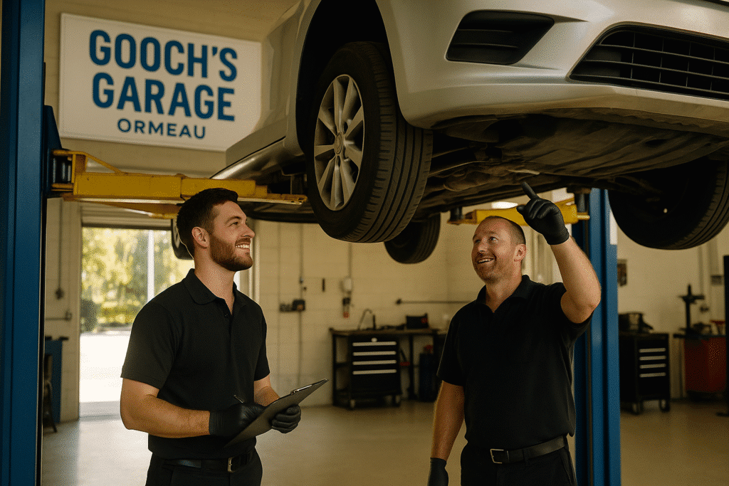 Friendly mechanics working in a bright, clean workshop